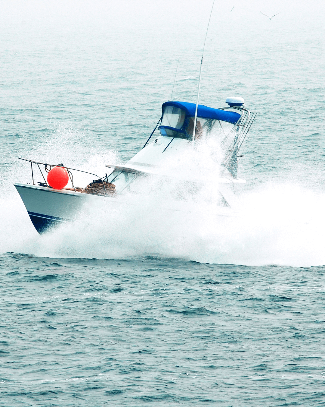 Fishing Boat in Waves
